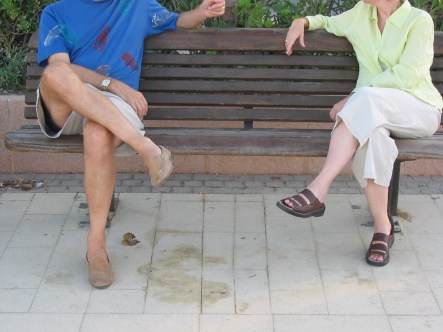 two people on a bench